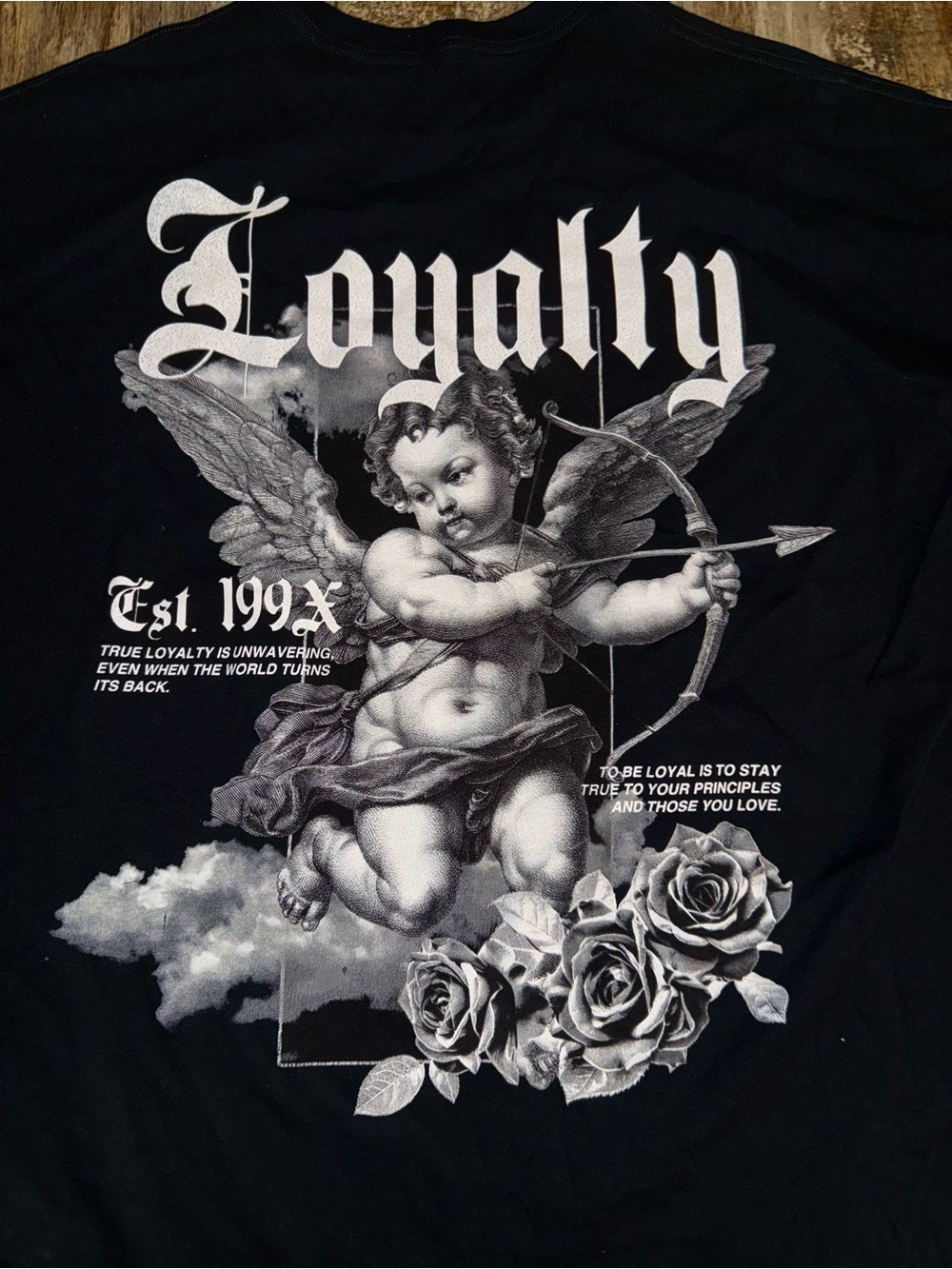 Loyalty “On The Low” graphic T-shirt
Black with white angel/rose  size 3X men